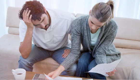 A couple frets while going over paperwork