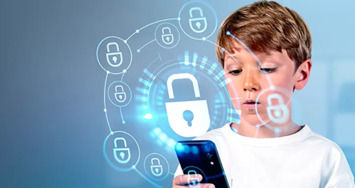 A child looking at a phone with security graphics overlaid