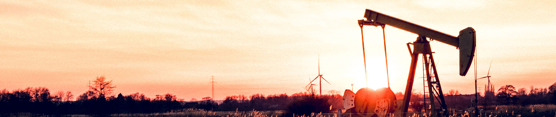 An oil field at dusk